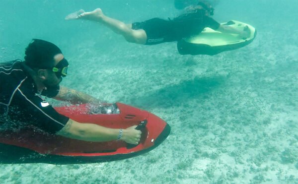 People riding seabob